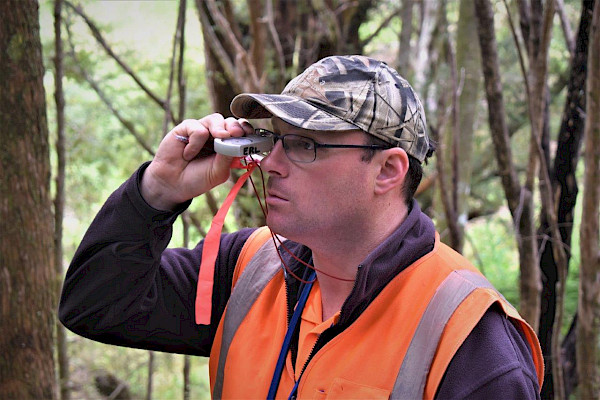 Michael Bergin measuring in a Permanent Sample Plot (PSP).